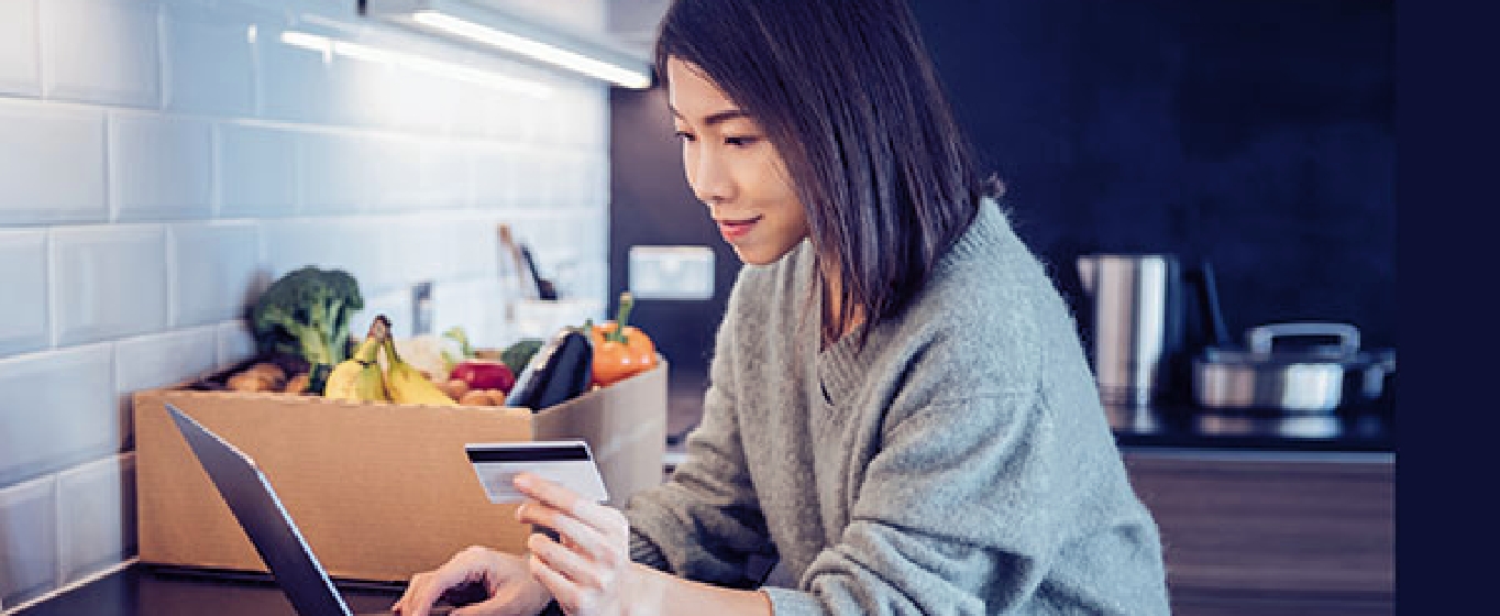 Woman banking online at home